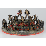 Set of 12 Resin Rocker Skulls + Display